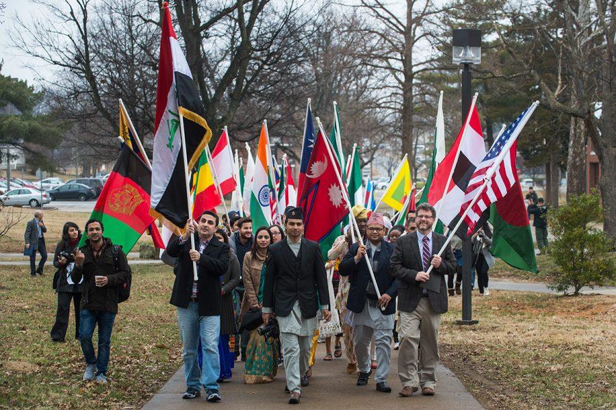 Marchers walk in the International Parade of Flags on Monday, Feb. 6, 2017, from Woody Hall to the Student Center. The parade was the kickoff event of International Festival 2017 at SIU. (Jacob Wiegand | @jawiegandphoto)
