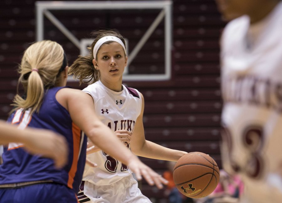 Junior guard Kylie Giebelhausen is guarded by Aces sophomore forward Kerri Gasper on Friday, Feb. 17, 2017, during a game against the Evansville Aces at SIU Arena. The Salukis lost to the Evansville Aces 74-61. (Bill Lukitsch | @lukitsbill)