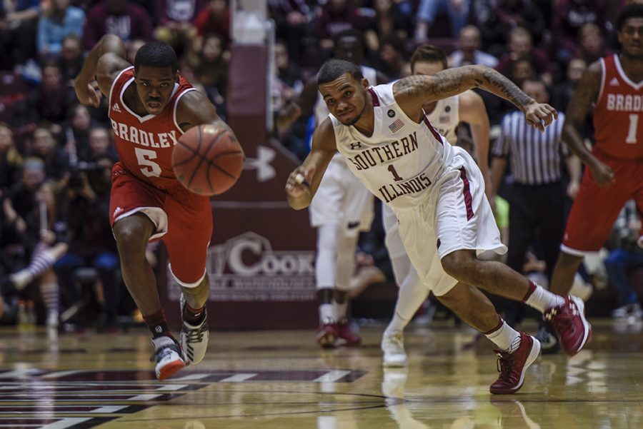 Senior guard Mike Rodriguez and Bradley freshman guard Darrell Brown attempt to outrun each other to gain possesion of the ball Wednesday, Feb. 1, 2017, at SIU Arena. The Salukis defeated Bradley 85-65. (Branda Mitchell | @branda_mitchell)