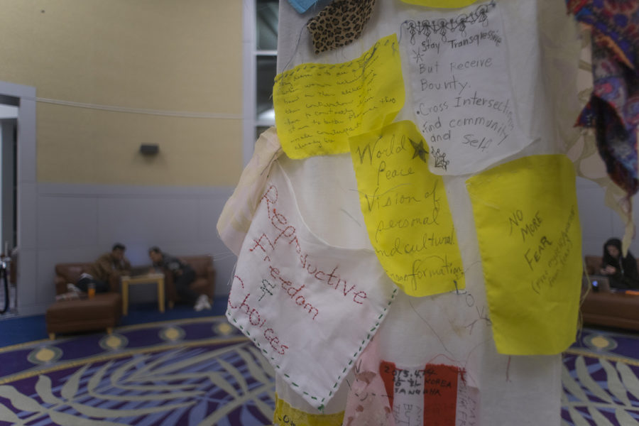A scroll adorned with handwritten notes hangs Monday, March 6, 2017, in the Morris Library rotunda. The “Dreaming Diversity and Art Display” is a three-week interactive installation. (Branda Mitchell | @branda_mitchell)