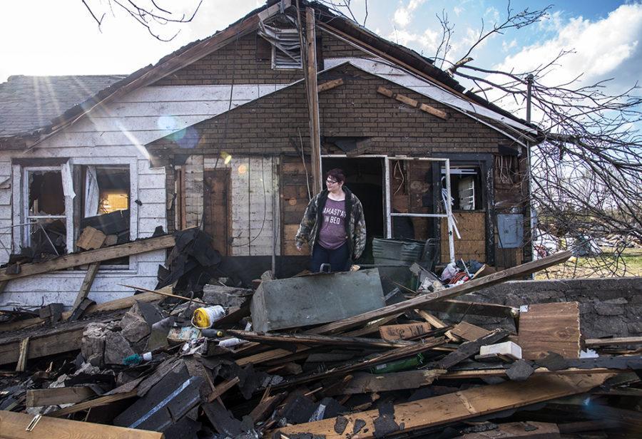 India Marsh surveys the destruction of her Elkville home Wednesday, March 1, 2017, after a tornado ripped through the town and several surrounding southern Illinois communities Tuesday night. Marsh said she has lived in the house her whole life. 