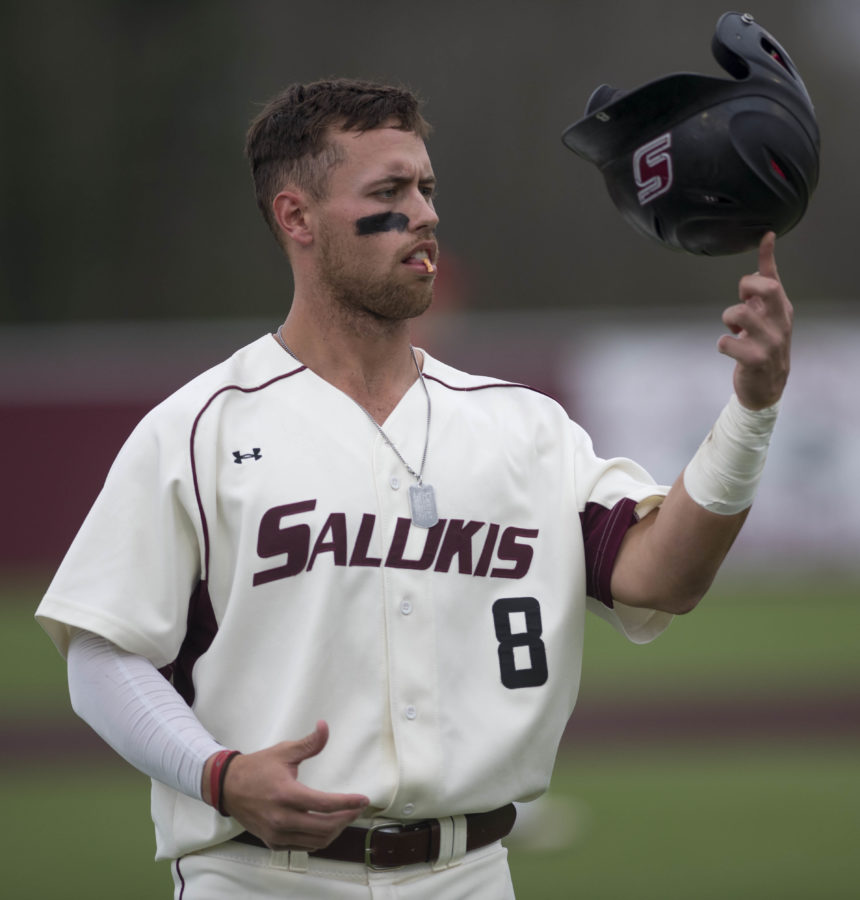 Senior outfielder Jake Hand spins his batters helmet on his finger Saturday, March 25, 2017, during the second of a three-game series against the Jacksonville State Gamecocks. The Salukis beat the Gamecocks 5-4 at Itchy Jones Stadium. (Bill Lukitsch | @lukitsbill) 