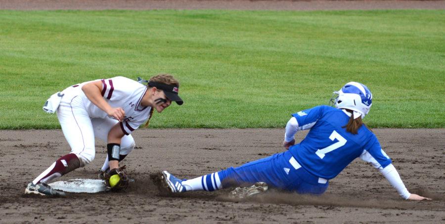 Freshman second baseman Maddy Vermejan prepares to tag out Drake sophomore Kennedy Frank during a stolen base attempt on Saturday, March 25, 2017, during SIUs 1-0 victory over Drake at Charlotte West Stadium. (Sean Carley | @SeanMCarley)