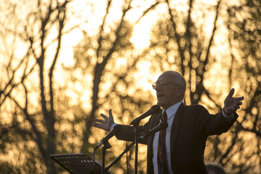 Rev. Ed Hoke leads a prayer Sunday, April 16, 2017, during the Easter sunrise service at Bald Knob Cross of Peace in Alto Pass. Hoke is the minister of Mission Expansion at Little Grassy United Methodist Camp in Makanda. (Branda Mitchell | @branda_mitchell)