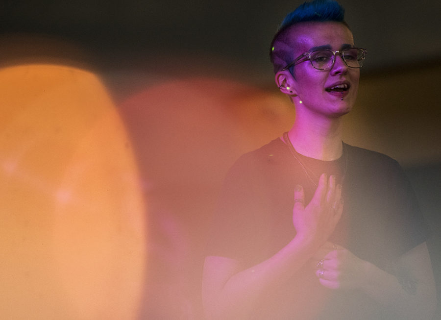 August Bishop, a junior from Mundelein studying fashion design merchandising, sings on Saturday, April 22, 2017, during SIU LGBTQ Resource Centers third annual Pride Prom at Grinnell Hall in Carbondale. (Morgan Timms | @Morgan_Timms)