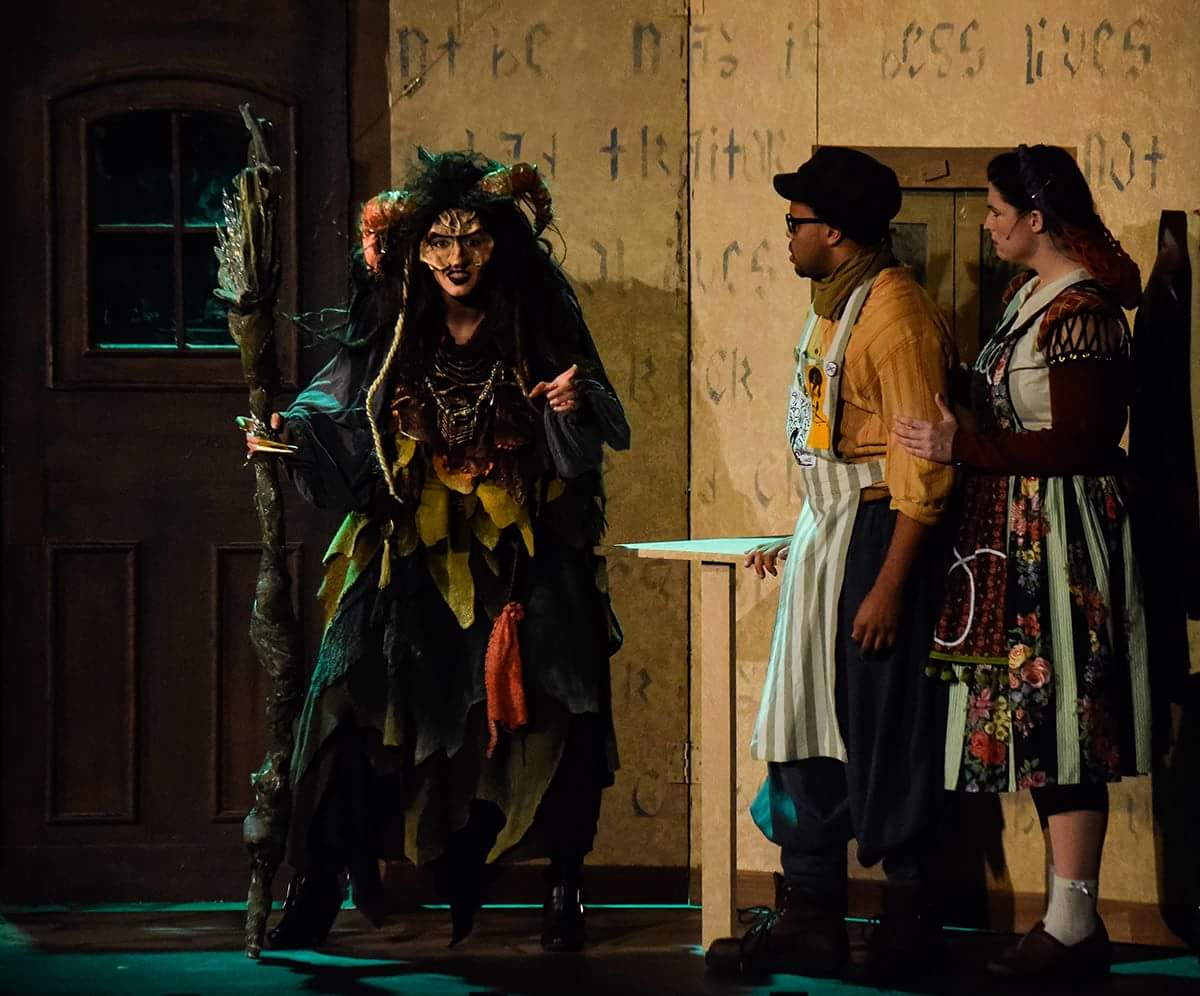 The Witch, portrayed by Michigan State graduate student Lyndsay Manson, back, warns the Baker, Eddie Ortega, of Orlando, Florida, of the curse she has placed upon him and his wife, during a Summer Playhouse 2017 musical series performance of “Into The Woods,” Saturday, June 17, 2017, in McLeod Theater.  (William Cooley | @Wcooley1980)