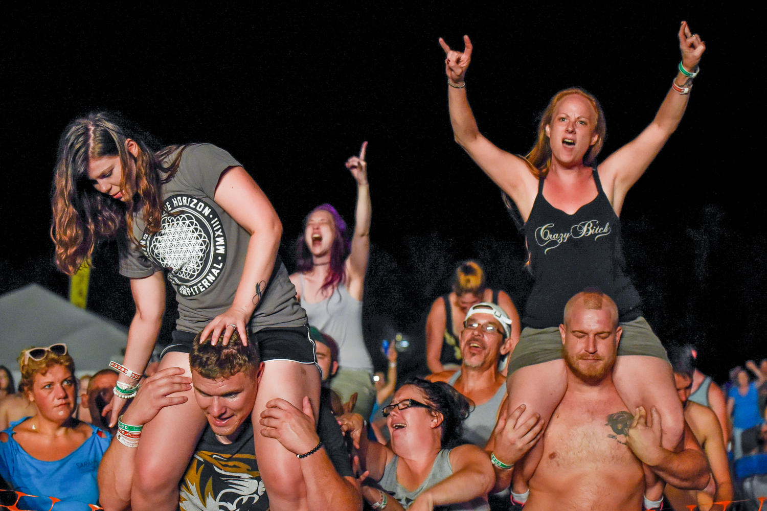 Moonstock festival-goers watch Saliva perform Friday, Aug. 18, 2017, during the music festival at Walker’s Bluff Winery in Carterville. The four-day music festival has already sold upwards of 15,000 tickets for the weekend-long event, will finish with a performance by Ozzy Osbourne during the solar eclipse Monday. (William Cooley | @Wcooley1980)