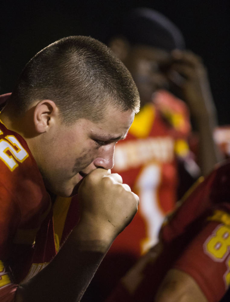 Murphysboro Red Devils A.J. Grammer chokes up after losing to the Carbondale Terriers in the the 100th meeting of the two teams on Friday, Aug. 25, 2017, at Doc Bencini Field, in Murphysboro, Illinois. (Ryan Michalesko | @photosbylesko)