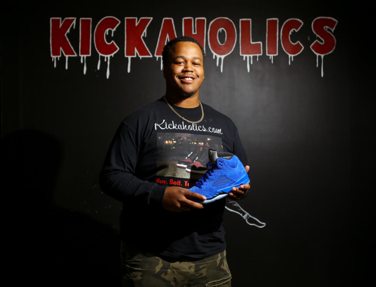 Trevondo Crockett, of East St. Louis, poses for a portrait among his merchandise Friday, Sept. 29, 2017 at his store Kickaholics on the Carbondale Strip. When I was younger, I wanted shoes that looked good, Crockett said. Even though I wasnt able to get them I still knew everything I could about them. Crockett, a SIU Class of 2014 alumni, is the owner of Kickaholics, a new collectors shoe store located on the Carbondale Strip. (Brian Muñoz | @BrianMMunoz)