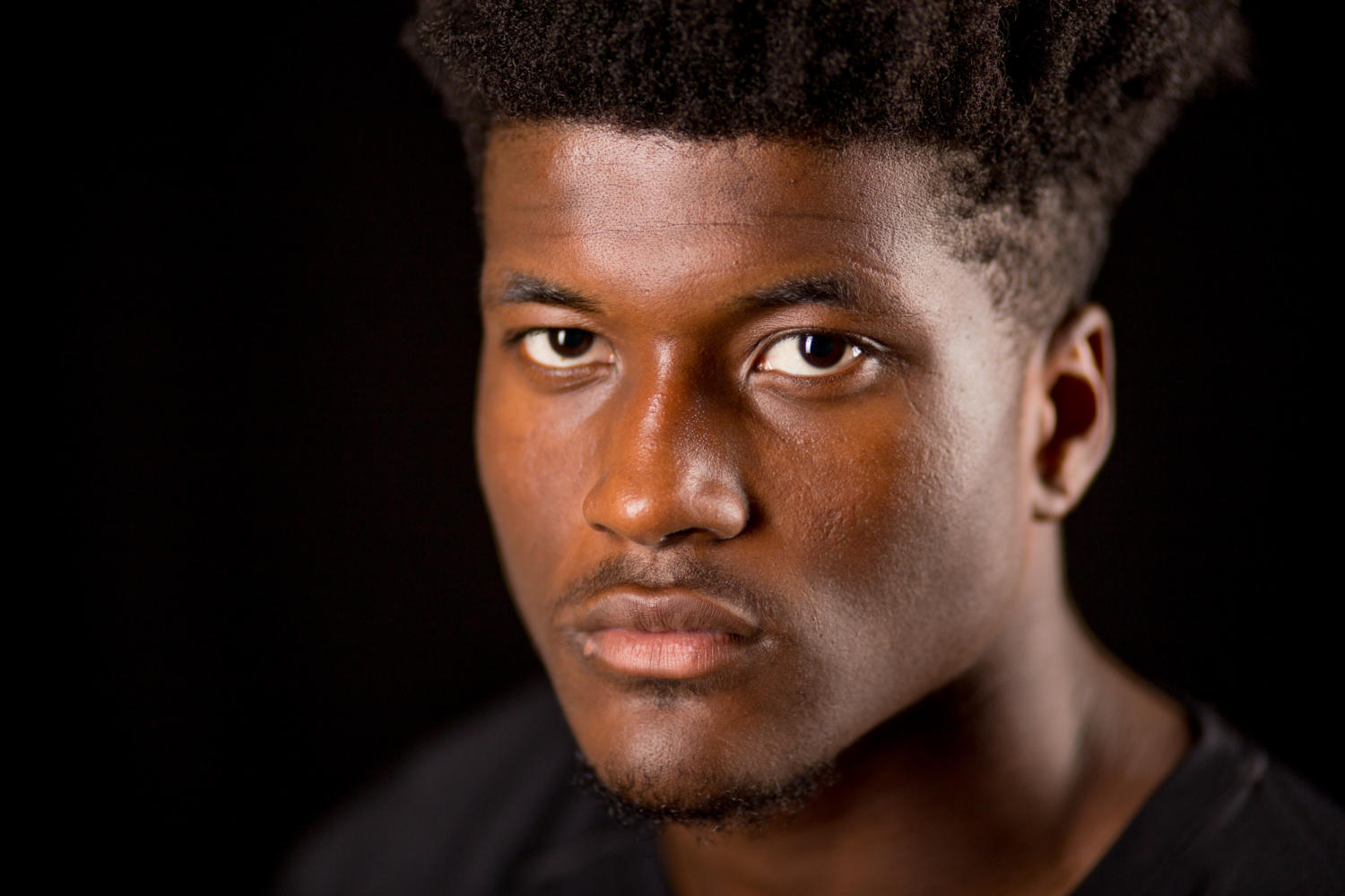 Raphael Leonard, of Starkville, Mississippi, poses for a portarit Monday, Sept. 18, 2017, at the Daily Egyptian photography studio. Leonard is a recent transfer from East Mississippi Community College and was on the Netflix original documentary series, Last Chance U.  (Brian Muñoz | @BrianMMunoz)