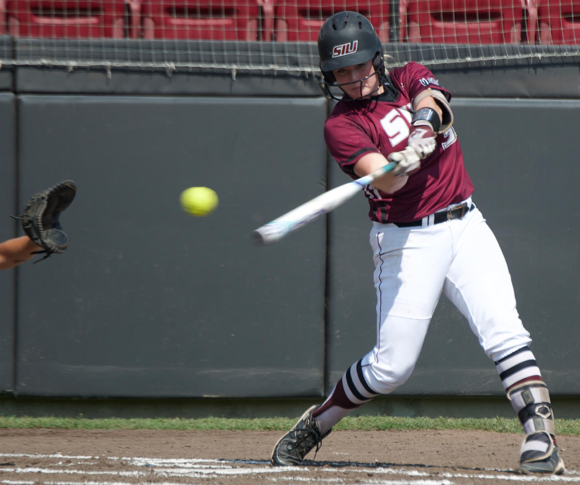 Sophomore infielder Kyleigh Decker (33) swings and misses the ball Saturday, Sept. 23, 2017, during the Salukis 5-0win against Lake Land College at Charlotte West Stadium.  (Mary Newman | @MaryNewmanDE)