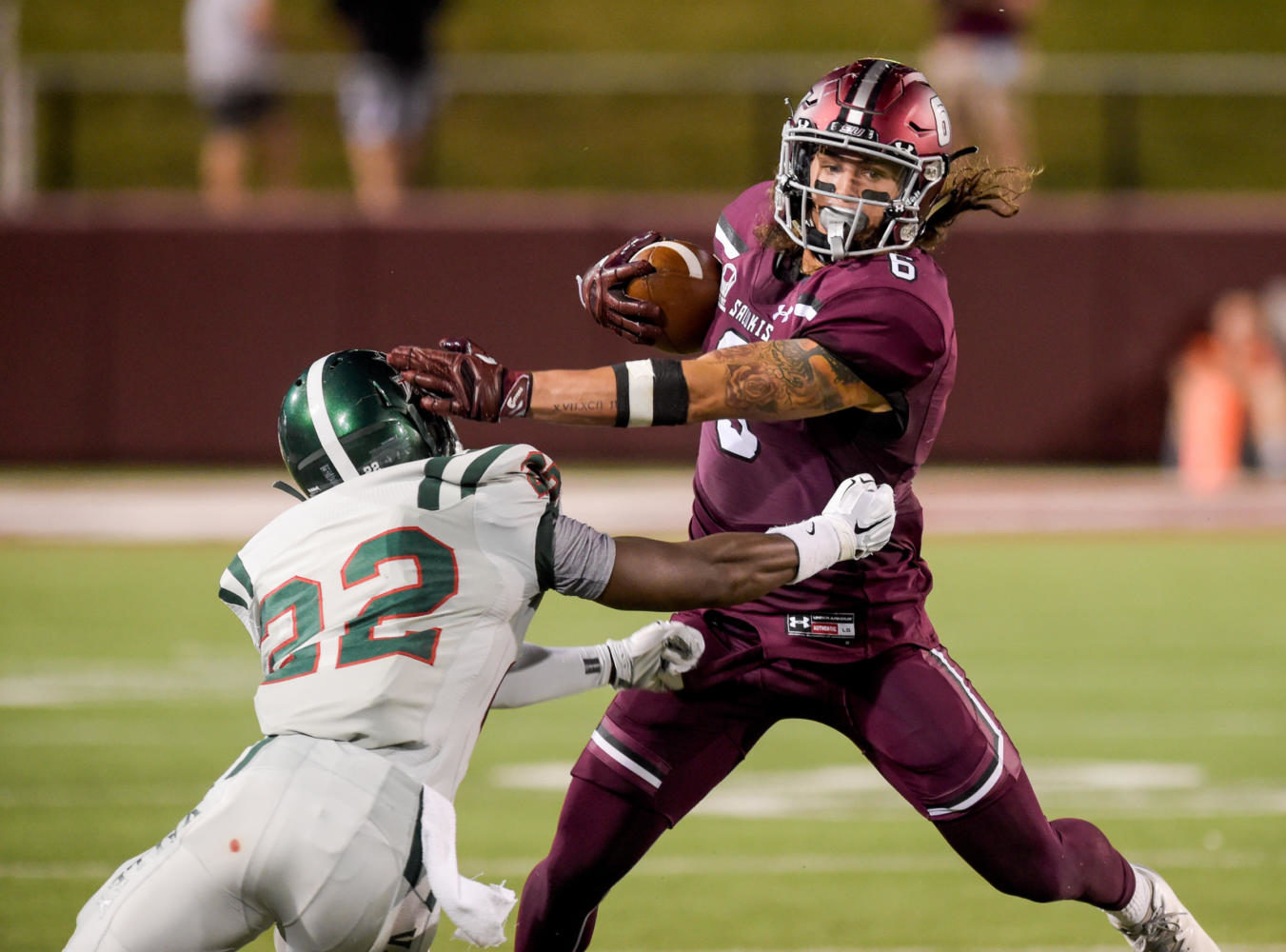 SIU senior wide receiver Connor Iwema (6) blocks Mississippi Valley's defensive back Adrian Campbell (22) during the second quarter of SIU’s home opener against the Mississippi Valley State Delta Devils Saturday, Sept. 9, 2017, at Saluki Stadium.  (Brian Muñoz | @BrianMMunoz)