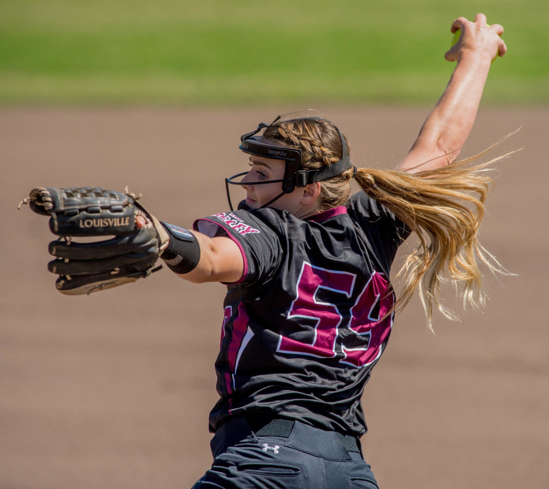 Senior pitcher Savannah Dover winds up a ball Sunday, Sept. 10, 2017, during the Salukis home opener against Rend Lake College at Brechtelsbauer Field. The Saluki Softball team returns to SIU after winning the 2017 Missouri Valley Conference championship. (Brian Muñoz | @BrianMMunoz)