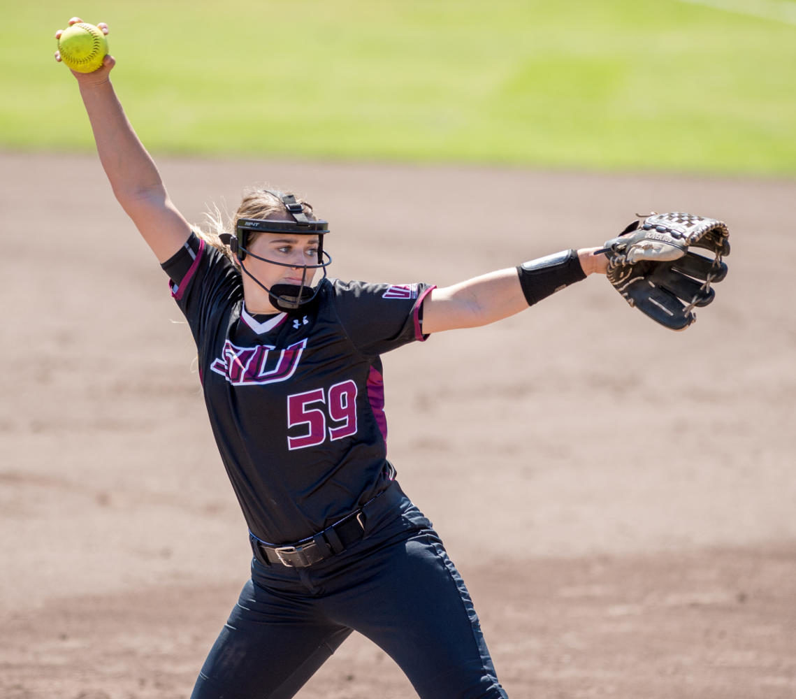 Senior pitcher Savannah Dover winds up a ball Sunday, Sept. 10, 2017, during the Salukis home opener against Rend Lake College. The Saluki Softball team returns to SIU after winning the 2017 Missouri Valley Conference championship. (Brian Muñoz | @BrianMMunoz)