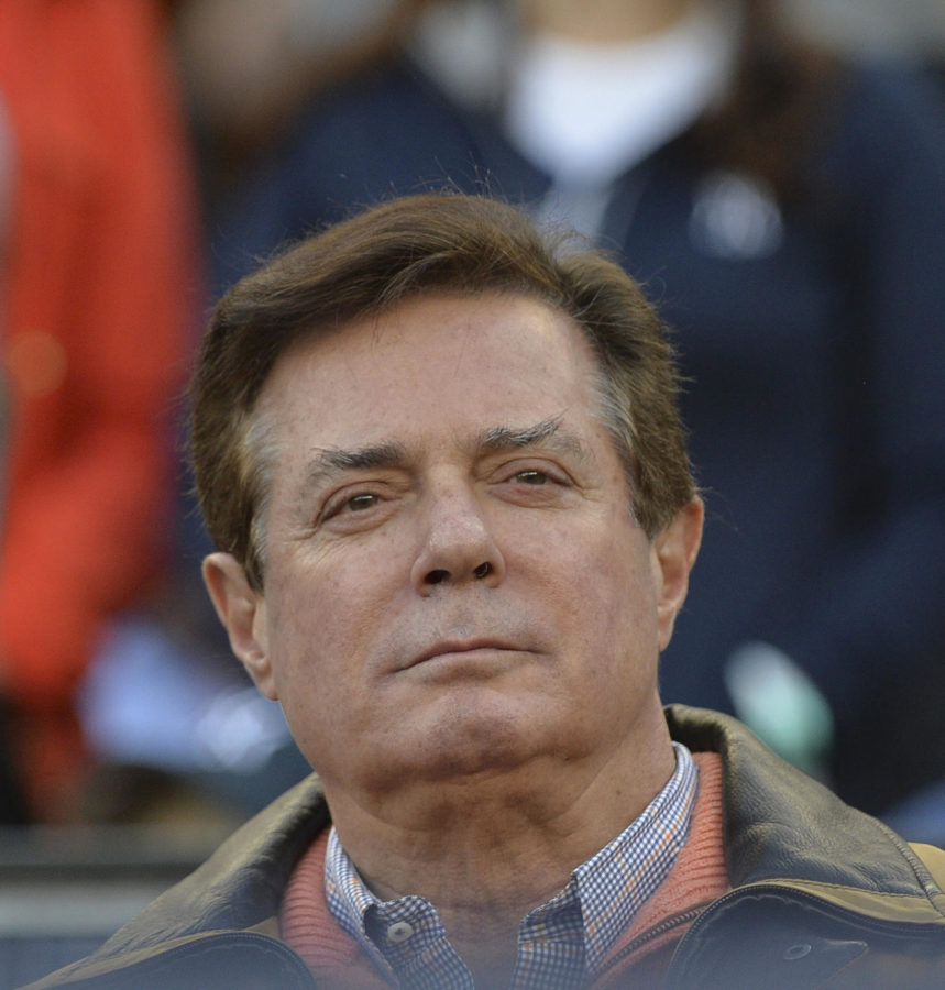 Paul Manafort on hand as the New York Yankees plays host to the Houston Astros in Game 4 of the American League Championship Series at Yankee Stadium in New York on Tuesday, Oct. 17, 2017. President Donald Trumps former campaign chairman, has surrendered to federal authorities, according to multiple reports. (Howard Simmons/New York Daily News/TNS)