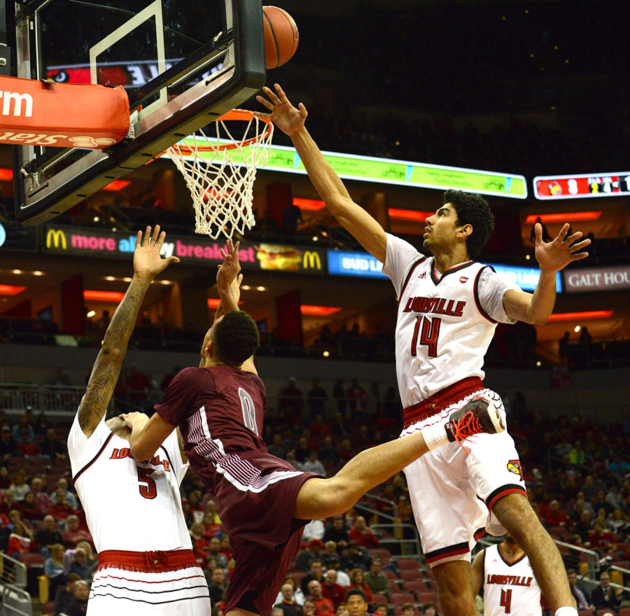 Senior forward Jonathan Wiley attempts to shoot a basket Tuesday, Nov. 21, 2017, during the Salukis’ 84-42 loss against the University of Louisville at KFC Yum! Center in Louisville, Kentucky. (Athena Chrysanthou | @Chrysant1Athena)
