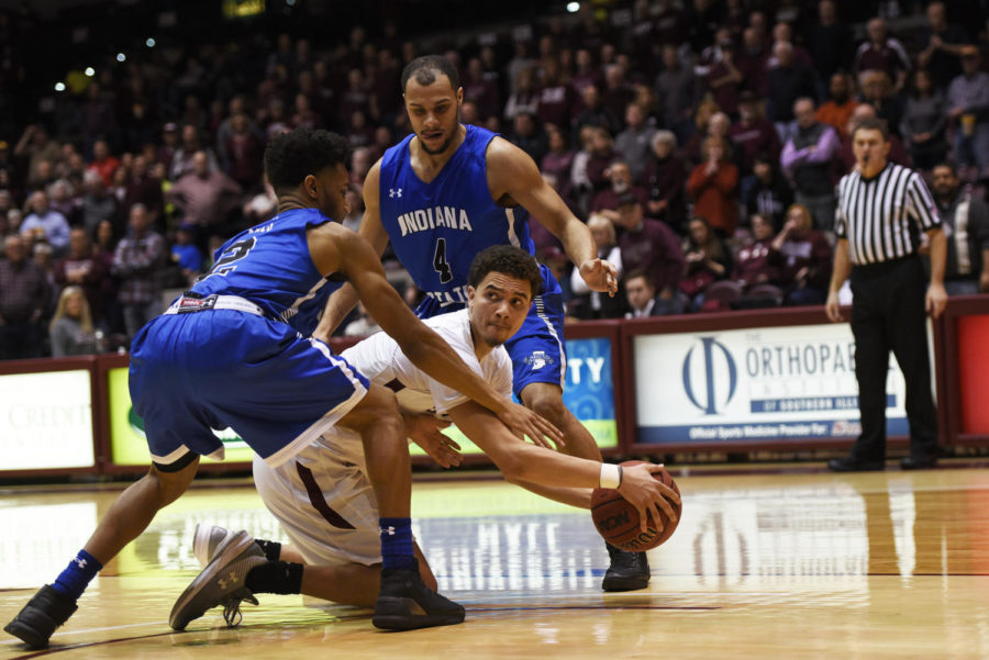 Saluki junior guard Marcus Bartley attempts to maintain control of the ball during SIUs 82-77 win against Indiana State on Wednesday, Jan. 24, 2018, at SIU Arena. (Anna Spoerre | @AnnaSpoerre)