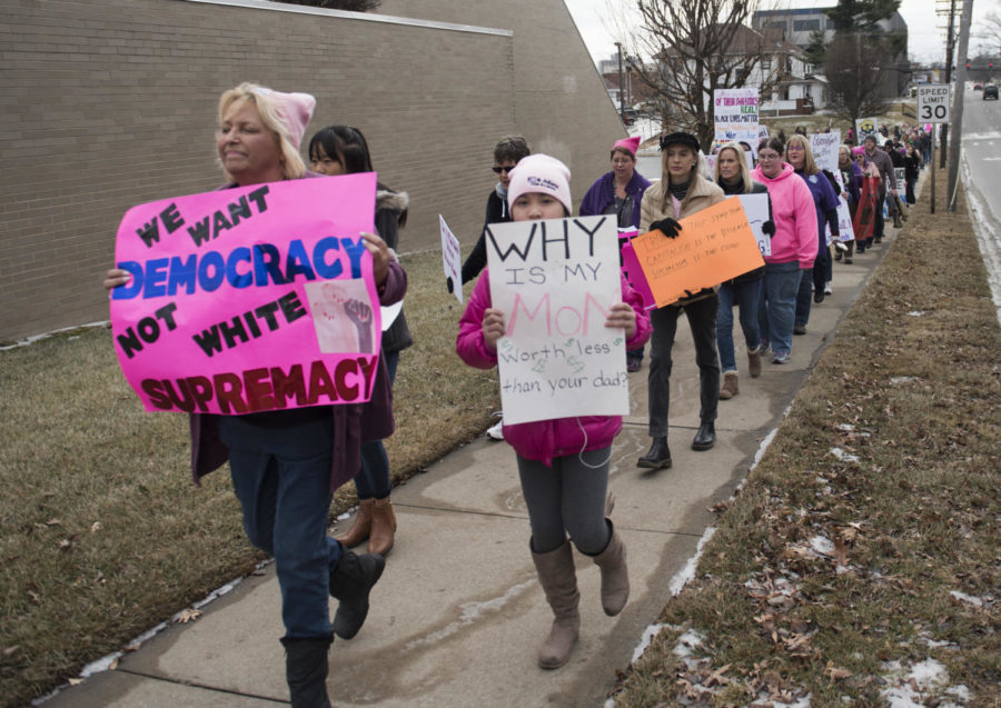 Vivian Robinson, of Harrisonburg, far left, and her daughter Rosie, immediate right, march Saturday, Jan. 20, 2018 during the Southern Illinois March to the Polls in Carbondale. Vivian says shes running for democrats committee woman of the 15th district and she feels strongly about womens issues, and feels strongly for a major change in the next election. (Dylan Nelson | @Dylan_Nelson99)