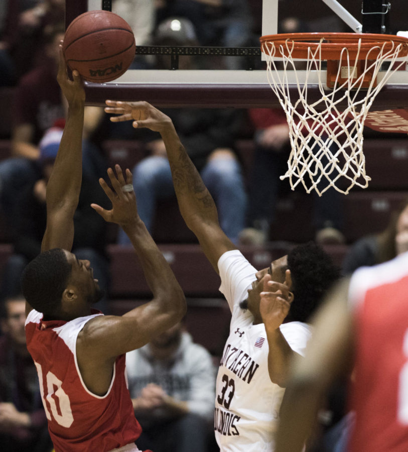 Junior center Kevin Pippen attempts to block the ball Sunday, Feb. 11, 2018, during the Salukis 74-57 win against the Bradley Braves at SIU Arena. (Dylan Nelson | @Dylan_Nelson99)