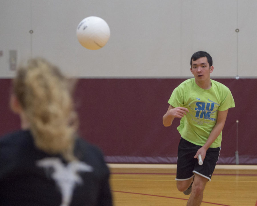 Sophomore Chemistry major Marcus Bean, 20, passes the ball to his teammate Monday, Jan. 29, 2018 during quidditch practice at the student recreation center in Carbondale. (Dylan Nelson | @Dylan_Nelson99)