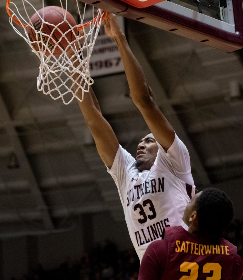 Junior center Kavion Pippen goes for a dunk Wednesday, Feb. 21, 2018, during the Loyola Ramblers 75-68 victory against the Southern Illinois University Salukis at SIU Arena. (Cameron Hupp | @CHupp04)