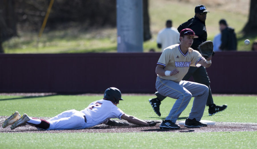 Senior short stop Connor Kopach dives for first base during the Warkhawks 13-7 win against the Salukis Saturday, March 3, 2018, at Itchy Jones Stadium Illinois. (Dylan Nelson | @Dylan_Nelson99)