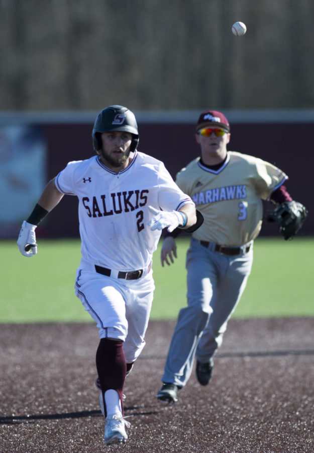 Junior left fielder Alex Lyon sprints to third base Saturday, March 3, 2018, during the Warkhawks 13-7 win against the Salukis at Itchy Jones Stadium. (Dylan Nelson | @Dylan_Nelson99)