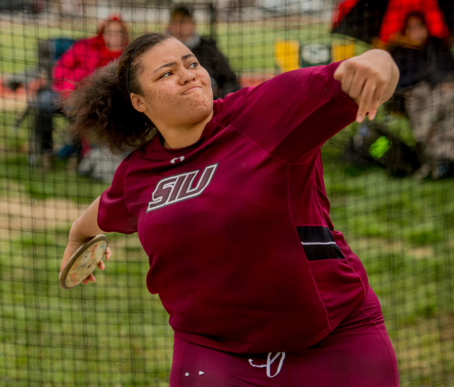 Southern Illinois freshman Aveun Moore launches a discus Friday, March 23, 2018, during the Bill Cornell Spring Classic at the Lew Hertzog Track and Field complex. (Brian Munoz | @BrianMMunoz)