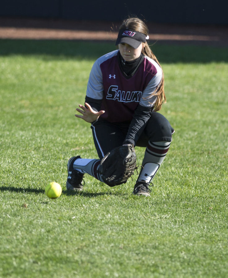Sophomore outfielder Susie Baranski crouches for the ball Friday, March 2, 2018,  during the Illinis 14-1 win against the Salukis at Charlotte West Stadium Illinois. (Dylan Nelson | @Dylan_Nelson99)