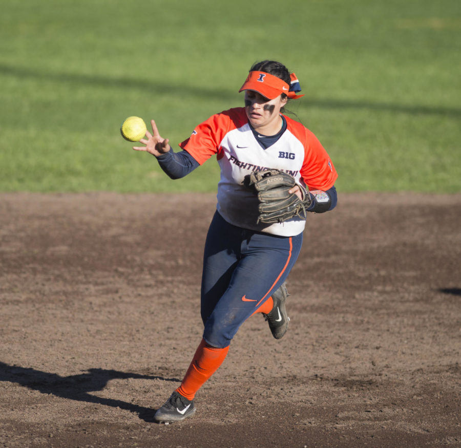 University of Illinois junior pitcher Danielle Brochu throws the ball Friday, March 2, 2018, during the Illinis 14-1 win against the Salukis at Charlotte West Stadium.(Dylan Nelson | @Dylan_Nelson99)