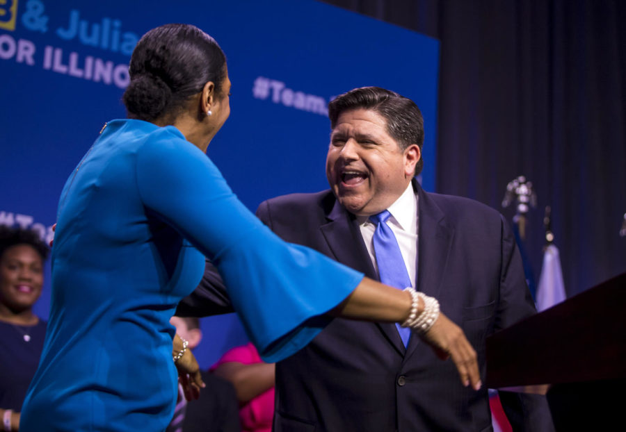 J.B. Pritzker declares victory with running mate Juliana Stratton in the Democratic gubernatorial primary on Tuesday, March 20, 2018 on election night at the Marriott Marquis in Chicago, Ill. (Brian Cassella/Chicago Tribune/TNS)