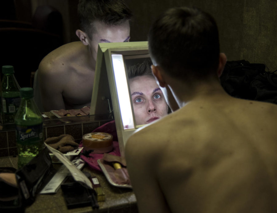 Jacob Hayes begins to apply makeup to become Veronica, Saturday, April 7, 2018, during the Total Eclipse of the Heart drag show in the Student Center at SIU. (Mary Newman | @MaryNewmanDE)