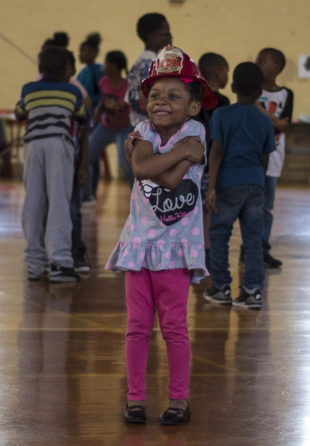 Aanilah Overall, 5, of Carbondale, plays inside a gymnasium during free time on Friday, April 13, 2018, at the Boys & Girls Club of Carbondale. (Mary Newman | @MaryNewmanDE)