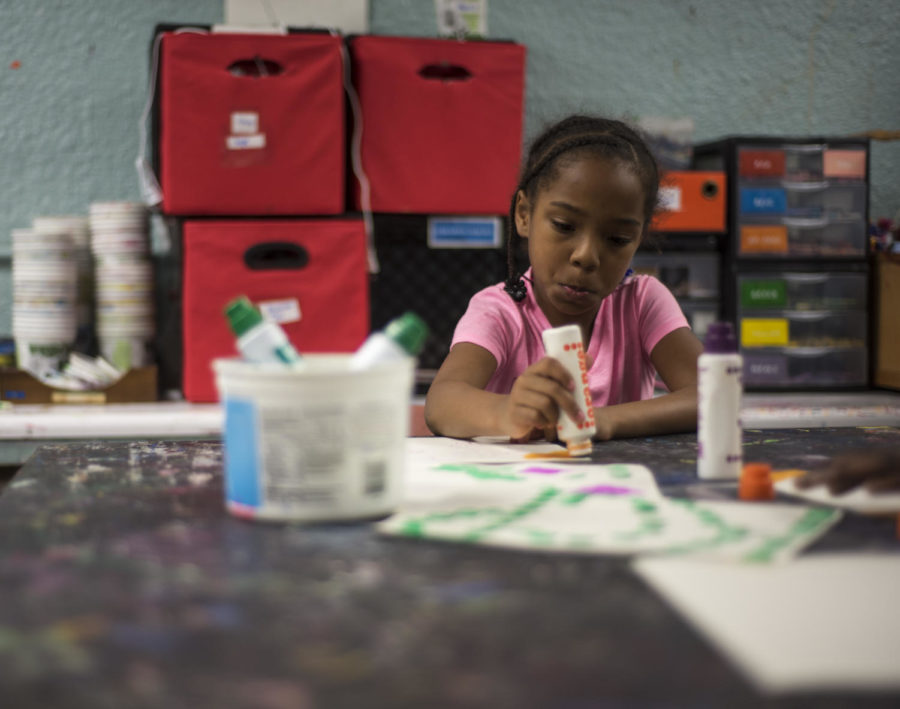 Jamiya Neal, 6, of Carbondale, paints a picture during an art activity, Friday, April 13, 2018, at the Boys & Girls Club of Carbondale. (Mary Newman | @MaryNewmanDE)
