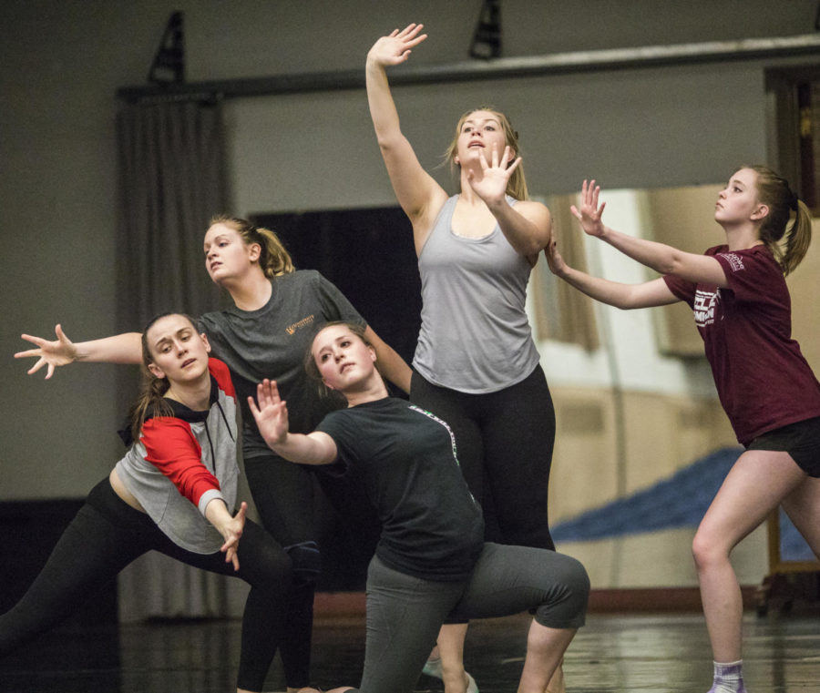 Members from the Southern Illinois Dance Company practice the start of a dance Thursday, April 13, 2018, during a rehearsal in preparation for the SIDC Spring Concert in the Furr Auditorium. (Corrin Hunt | @CorrinIHunt)
