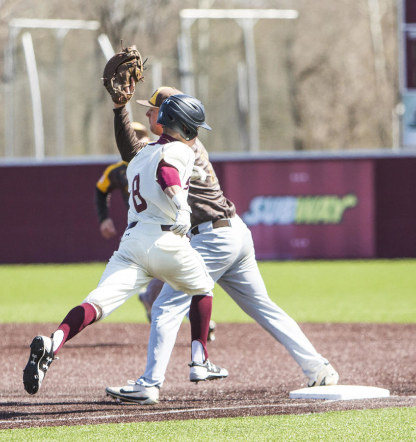 Southern Illinois junior Nikola Vasic sprints to first base after hitting the ball, Saturday, April 7, 2018, during the Valparaiso University Crusaders 6-2 victory against the Southern Illinois Salukis at Itchy Jones Stadium. (Corrin Hunt | @CorrinIHunt)