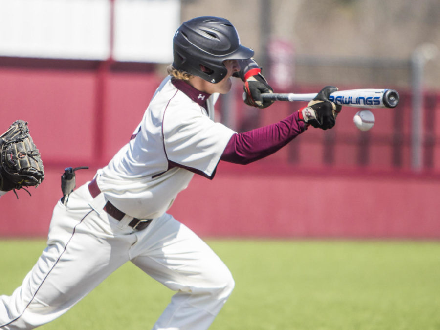 Southern Illinois infielder Connor Kopach (7) bunts the ball, Saturday, April 7, 2018, during the Valparaiso University Crusaders 6-2 victory against the Southern Illinois Salukis at Itchy Jones Stadium. (Corrin Hunt | @CorrinIHunt)