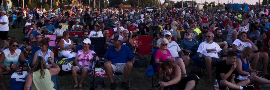 The crowd waits for the band during intermission, Thursday, July 12, 2018, at the Jungle Dogs concert at the Conrner of Route 13 and Washington Street for the Sunset Summer Concert Series. (Nick Knappenburger)
