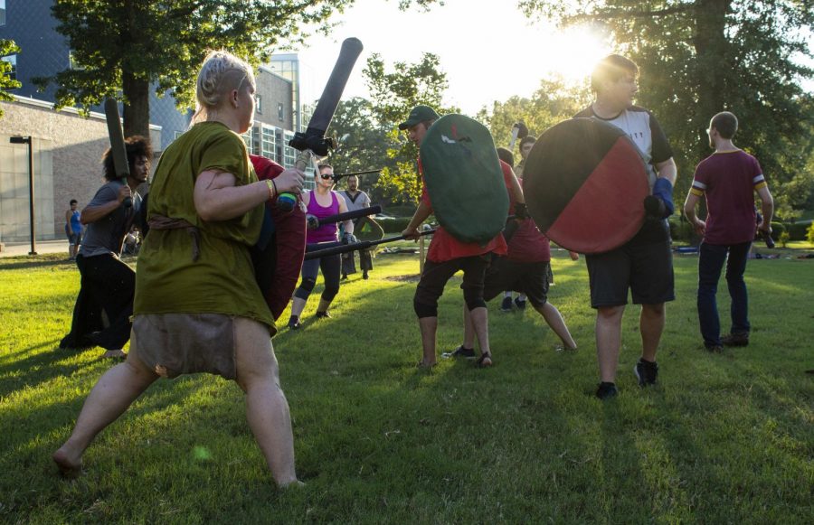 Members of SIU’s Medieval Combat Club battle in front of Morris Library, on Tuesday, Sept. 4, 2018. (Carson VanBuskirk | @carsonvanbDE)