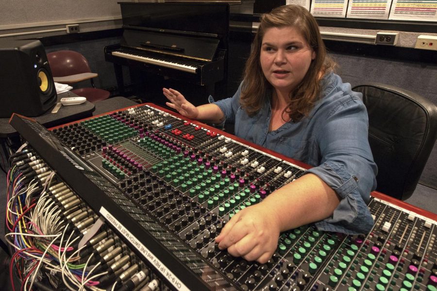 Jenny Johnson, a lecturer in the Radio, Television, and Digital Media department of SIU operates a soundboard. Oct. 17, 2018. (Chase Jordan | @chasejordande)