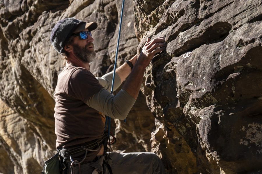 Mike Gowen, of Murray, Ky., scales a rock wall in Giant City State Park near Makanda on Sunday, Oct. 21, 2018. Gowen said he enjoys the physicality behind rock climbing and how it allows you to clear you mind from everything else, and focus on the wall. (Carson VanBuskirk | @carsonvanbDE)