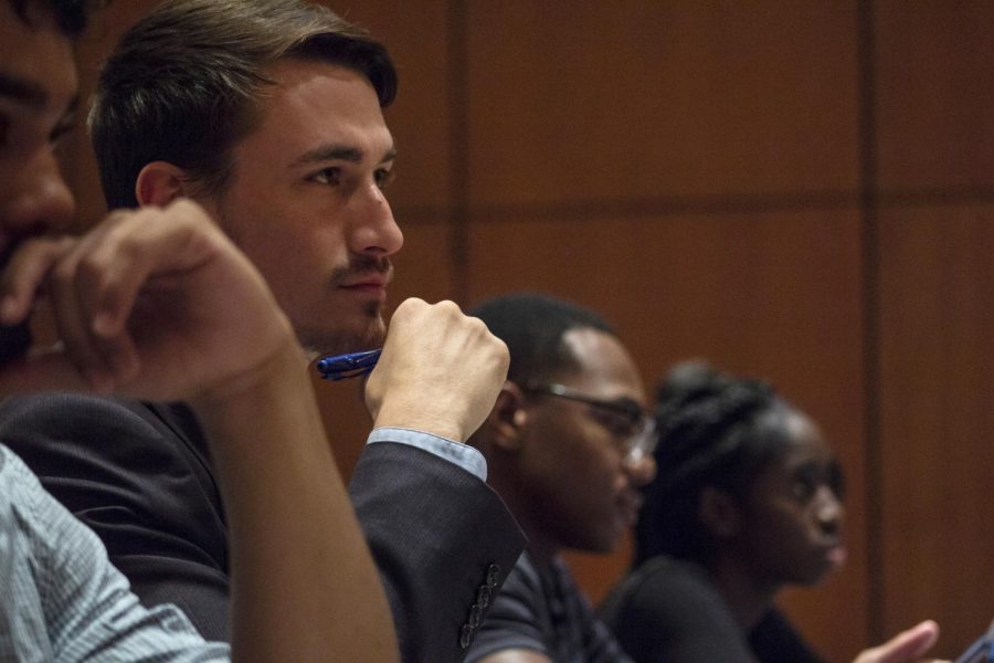 Trey Hentis, a senior majoring in mechanical engineering, listens during an undergraduate student government meeting, Tuesday, Oct. 30, 2018, inside the Student Center. (Isabel Miller | @IsabelMillerDE)