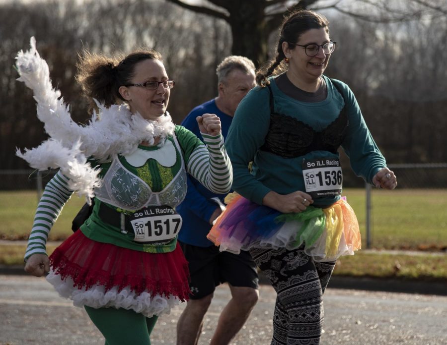 Amber Blakeslee and Ayla Amadio of Carbondale jog together, Saturday, Dec. 1, 2018, during the Santa Speedo 5K Run/Walk at the Life Community Center. Its actually our first run like this here today, says Blakeslee. (Nick Knappenburger |@nickknappenburger_de)