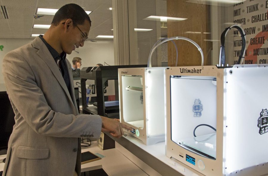 Nathaniel Jordan, Chief Executive Officer of SPREKK, operates a 3D printer inside the Dunn-Richmond Facility. Nov. 29th, 2018. (Chase Jordan|@chasejordande)