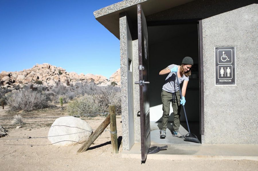 Volunteer Alexandra Degen cleans a restroom at Joshua Tree National Park on January 4, 2019, in Joshua Tree National Park, Calif. Volunteers with Friends of Joshua Tree National Park have been cleaning bathrooms and trash at the park as the park is drastically understaffed during the partial government shutdown. Campgrounds and some roads have been closed at the park due to safety concerns.
