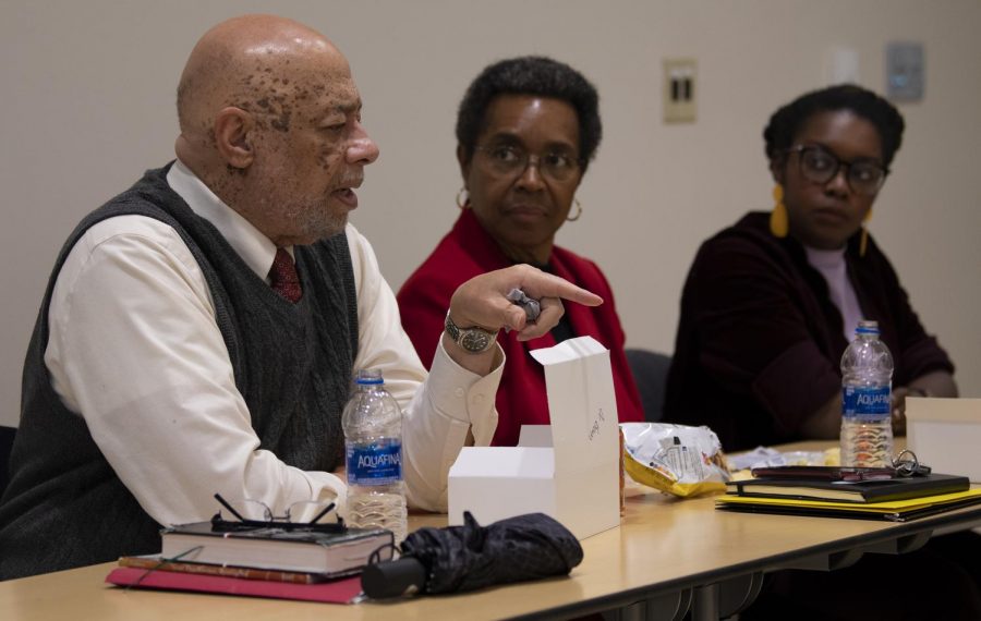Reverend Joseph A. Brown, speaks about diversity and issues within SIU alongside Carolin Harvey, Seyi Amosu, on Wednesday, Feb. 20, 2019, inside the Student Services Building at SIU. 