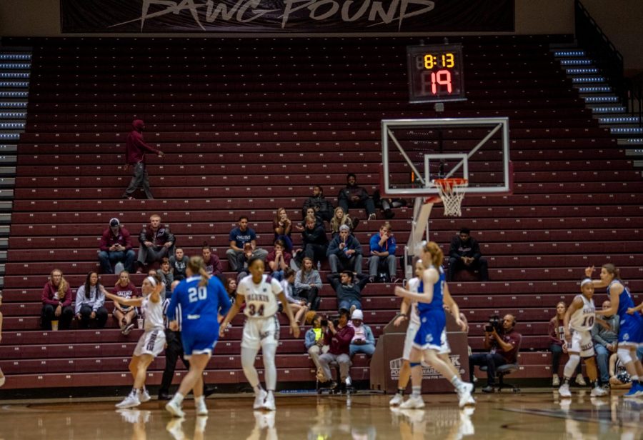 Fans watch game action on Friday, March 1, 2019, during a matchup between the Southern Illinois Salukis and the Drake Bulldogs at SIU Arena.