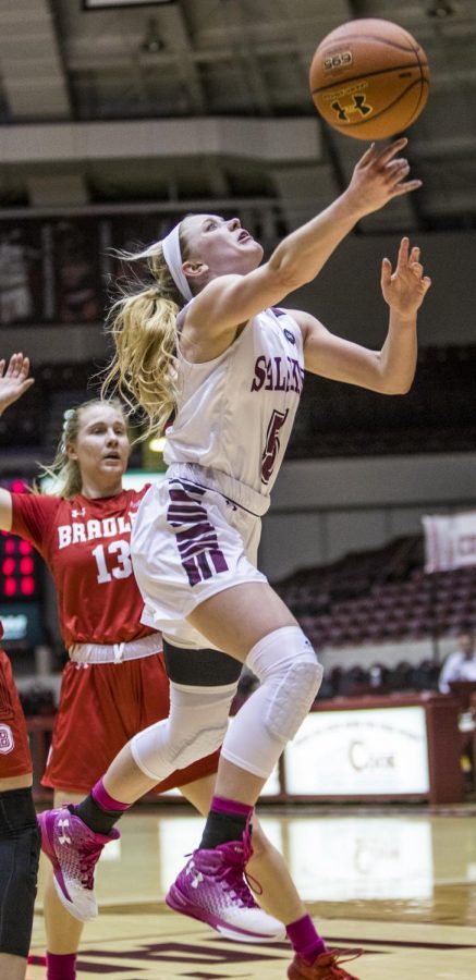 Saluki freshman guard Caitlin Link goes up for a basket Friday, Feb. 15, 2019, during the Salukis 55-62 win against the Bradley Braves at SIU Arena.