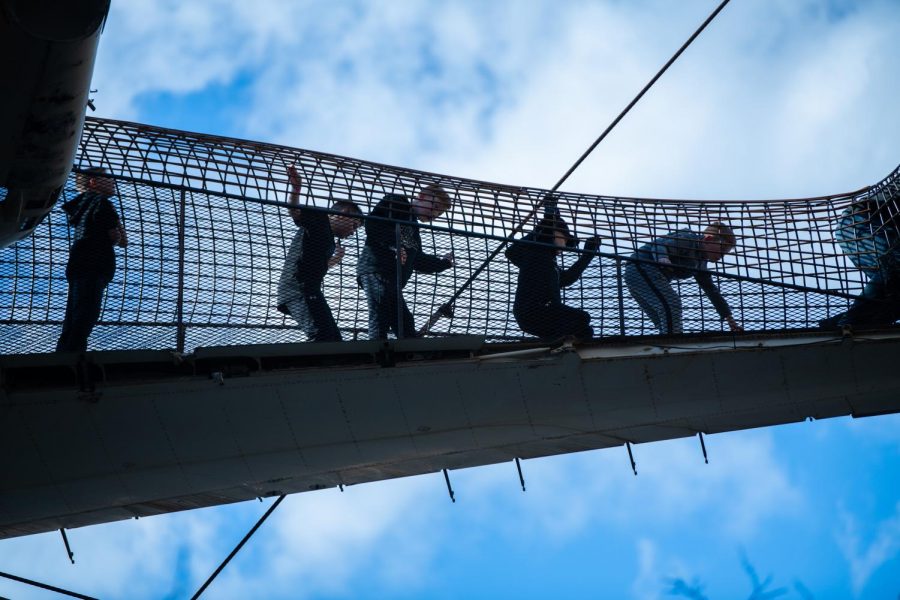 Children climb over a planes wing inside a series of wire tunnels in the sky on Saturday, March 9, 2019 at the St. Louis City Museum. There are two planes suspended 50 feet in the air in the museums MonstroCity.
