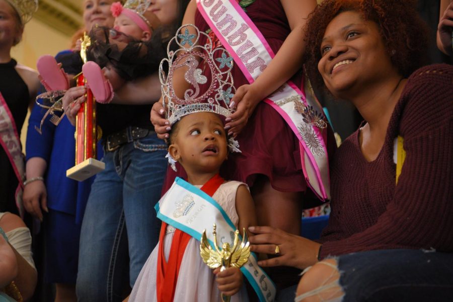 Two-year-old Aniyah Mchenry, of Carbondale, reacts on Saturday, March 23, 2019 during the Under The Sea Pageant at the University Mall. 